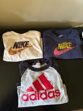 Nike Kids Navy Tee with Yellow & Red Logo